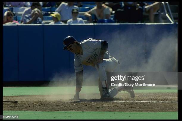 First baseman Bill Buckner of the Boston Red Sox slides into base. Mandatory Credit: Gray Mortimore/Allsport