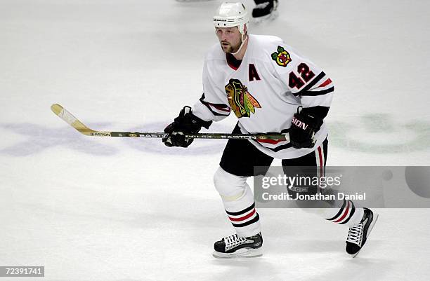 Jon Klemm of the Chicago Blackhawks in action during the game against the Phoenix Coyotes at United Center in Chicago, Illinois. The Blackhawks won...