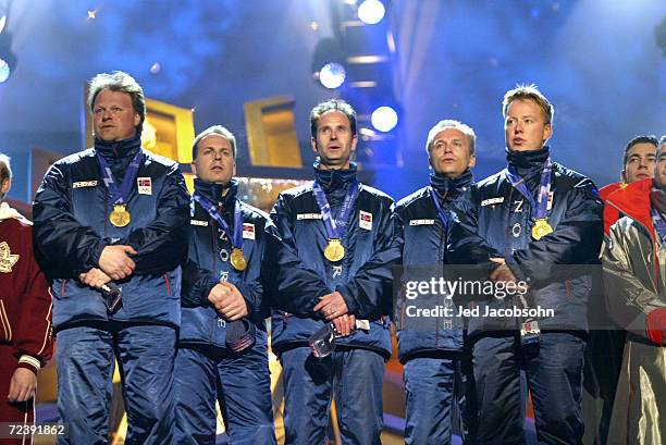 Paal Trulsen, Lars Vaaberg, Flemming Davanger, Bent Aanund Ramsfjell and Torger Nergaard of Norway receive their gold medals in the men's curling at...