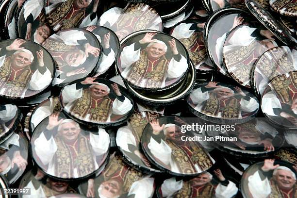 Buttons with a picture of the new pope, Cardinal Joseph Ratzinger, pope Benedikt XVI, are offered on April 24, 2005 in a store in Marktl, Ratzingers...