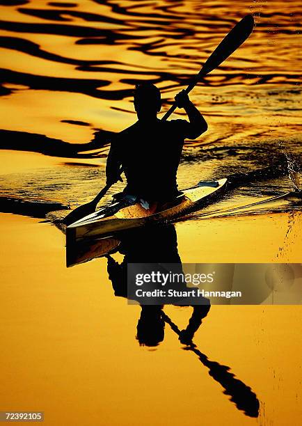 Kayakers warm up before the men's K-1 500 metre semifinal on August 26, 2004 during the Athens 2004 Summer Olympic Games at the Schinias Olympic...