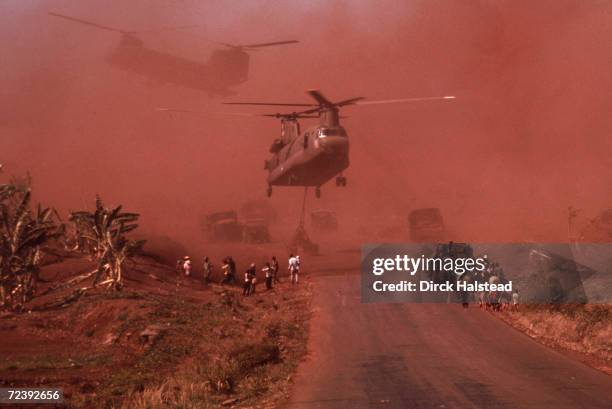 American helicopters helping evacuate Vietnamese civilians from around Xuan Loc.