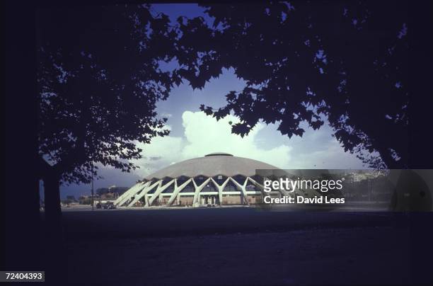 Exterior of the Rome Sports Palace, designed by Pier Luigi Nervi for the 1960 Olympic Games; it has a 200-ft. Wide dome with pattern that provides...