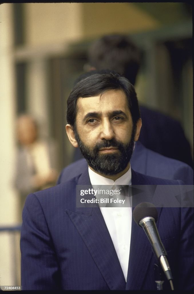 Iranian Foreign Minister Ali Akbar Velayati talking to the