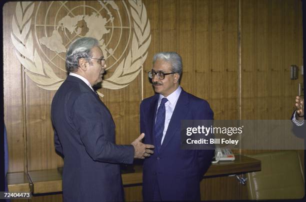 Secretay General Javier Perez de Cuellar talking with Iraqi Foreign Minister Tareq Aziz during the UN meditated peace talks between Iran and Iraq.