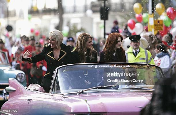 Sarah Harding, Cheryl Tweedy and Nicola Roberts of Girls Aloud arrive as retail tycoon Mohamed Al Fayed launches Harrod's annual Christmas...