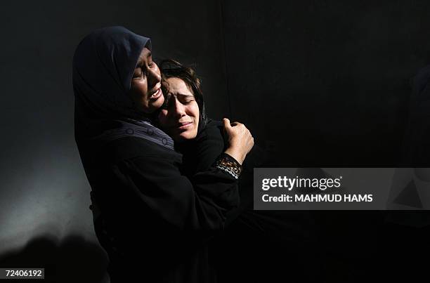 Palestinian women mourn during the funeral of Ayman and Raed Yassin in Beit Lahia, 04 November 2006. The brothers, both in their twenties, were...