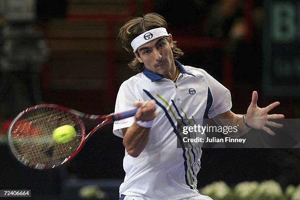 Tommy Robredo of Spain plays a forehand in his match against Nikolay Davydenko of Russia in the semi finals during day six of the BNP Paribas ATP...