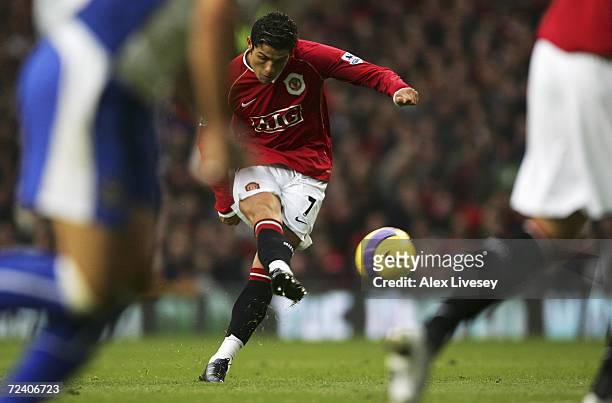 Cristiano Ronaldo of Manchester United scores his team's second goal during the Barclays Premiership match between Manchester United and Portsmouth...