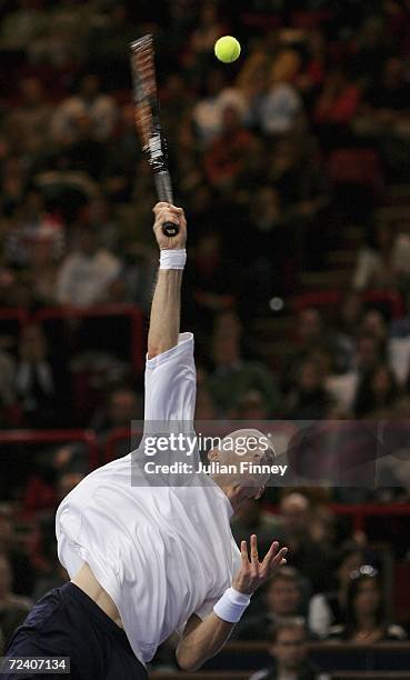 Nikolay Davydenko of Russia serves to Tommy Robredo of Spain in the semi finals during day six of the BNP Paribas ATP Tennis Masters Series at the...