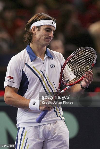 Frustrated Tommy Robredo of Spain looks on during his match against Nikolay Davydenko of Russia in the semi finals on day six of the BNP Paribas ATP...