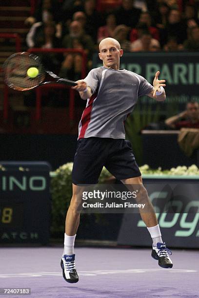 Nikolay Davydenko of Russia plays a forehand during his match against Tommy Robredo of Spain in the semi finals on day six of the BNP Paribas ATP...