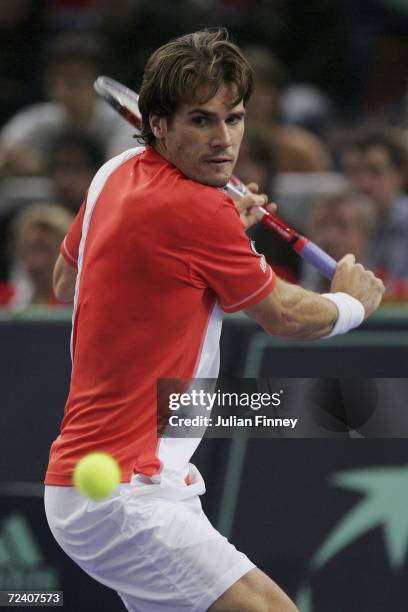Tommy Haas of Germany plays a backhand in his match against Dominik Hrbaty of Slovakia in the semi finals on day six of the BNP Paribas ATP Tennis...