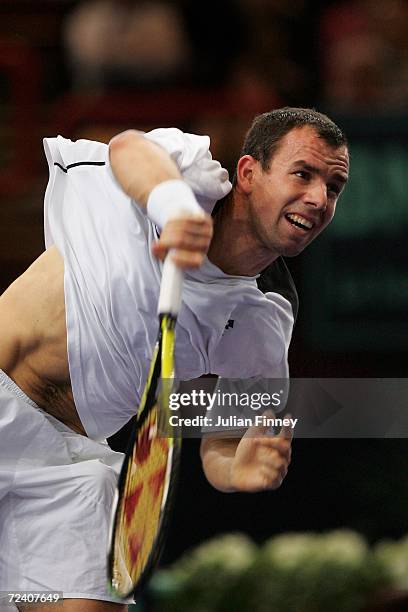 Dominik Hrbaty of Slovakia serves to Tommy Haas of Germany in the semi finals on day six of the BNP Paribas ATP Tennis Masters Series at the Palais...