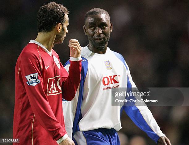 Ryan Giggs of Manchester United chats with Andy Cole of Portsmouth after the Barclays Premiership match between Manchester United and Portsmouth at...