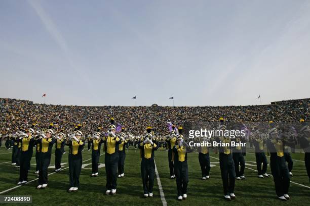 The Michigan Wolverines Marching Band performs during halftime of a game against Ball State on November 4, 2006 at Michigan Stadium in Ann Arbor,...