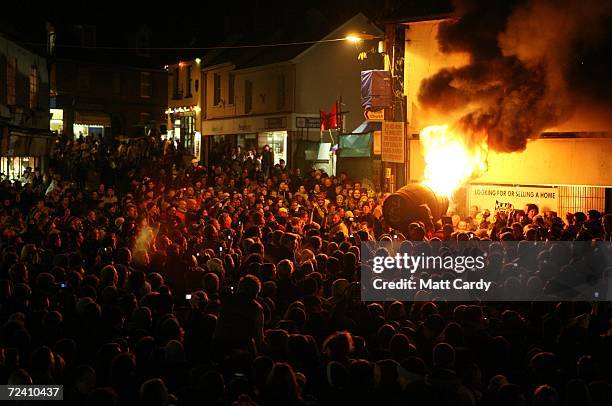 General view of the square with the crowds and a burrning barrel soaked in tar on November 4 2006 in Ottery St Mary, Devon, England. The 400-year-old...