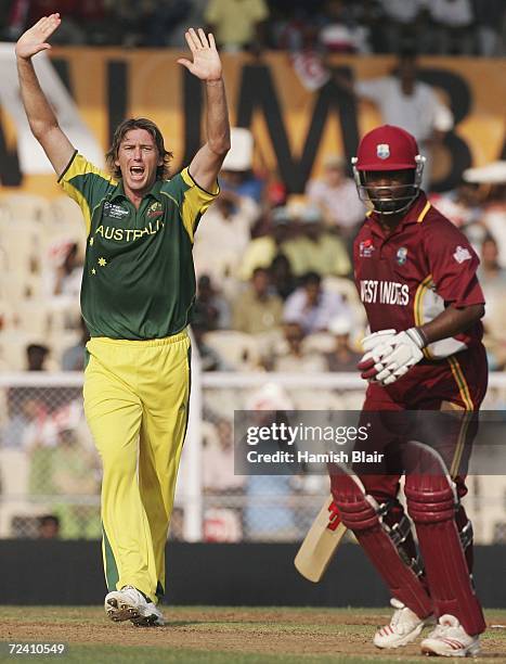 Glenn McGrath of Australia celebrates the wicket of Brian Lara of the West Indies during the final of the ICC Champions Trophy between Australia and...