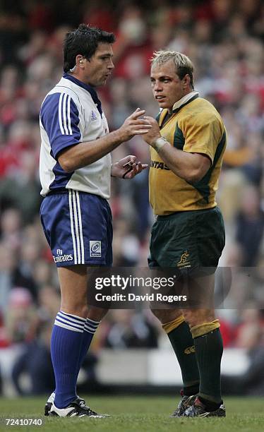 Referee Steve Walsh of New Zealand speaks with Phil Waugh, the Australian captain during the Invesco International match between Wales and Australia...