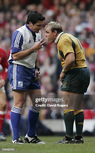 Referee Steve Walsh of New Zealand speaks with Phil Waugh, the Australian captain during the Invesco International match between Wales and Australia...