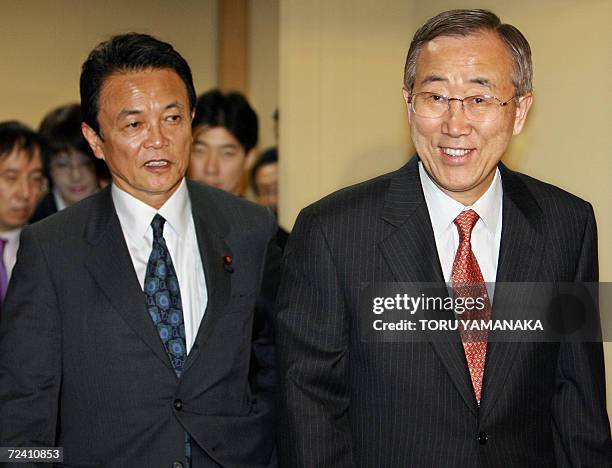 Japanese Foreign Minister Taro Aso and his South Korean counterpart Ban Ki-Moon appear at a Japanese restaurant for their meeting in Tokyo, 05...