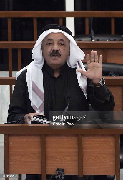 Former Iraqi Vice President Taha Yassin Ramadan argues with chief judge Raouf Abdel Rahman as he receives his verdict during his trial in the...