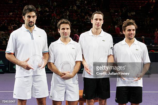 Nenad Zimonjic of Serbia & Montengro, Fabrice Santoro of France, Michael Llodra of France and Arnaud Clement of France pose for photos after the...