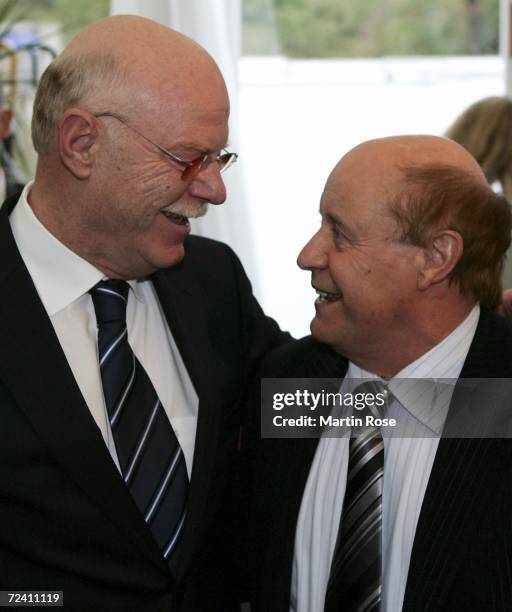 Peter Struck and Charly Doerfel pose during the birthday party of German soccer legend Uwe Seeler at the AOL Arena on November 5, 2006 in Hamburg,...