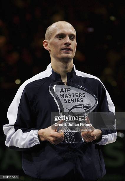 Nikolay Davydenko of Russia poses with the ATP Masters Series trophy after defeating Dominik Hrbaty of Slovakia in the final during day seven of the...