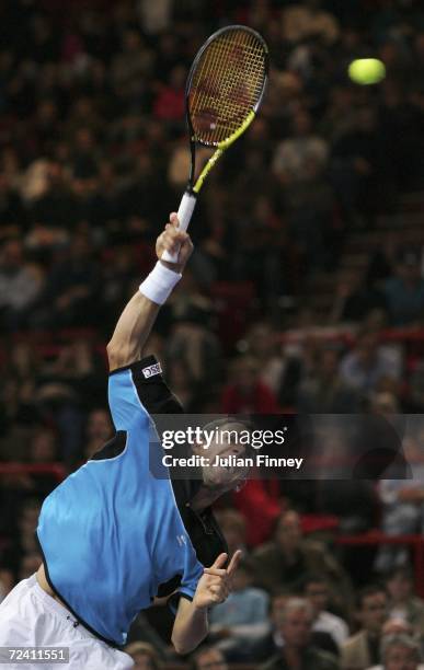 Dominik Hrbaty of Slovakia serves to Nikolay Davydenko of Russia in the final during day seven of the BNP Paribas ATP Tennis Masters Series at the...