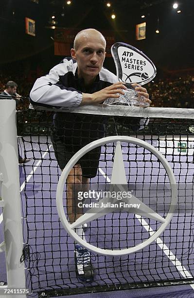 Nikolay Davydenko of Russia poses with the ATP Masters Series trophy after defeating Dominik Hrbaty of Slovakia in the final during day seven of the...