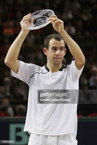 Dominik Hrbaty of Slovakia holds up his runners up trophy after losing to Nikolay Davydenko of Russia in the final during day seven of the BNP...