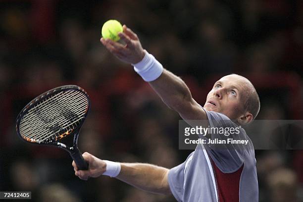 Nikolay Davydenko of Russia serves to Dominik Hrbaty of Slovakia in the final on day seven of the BNP Paribas ATP Tennis Masters Series at the Palais...