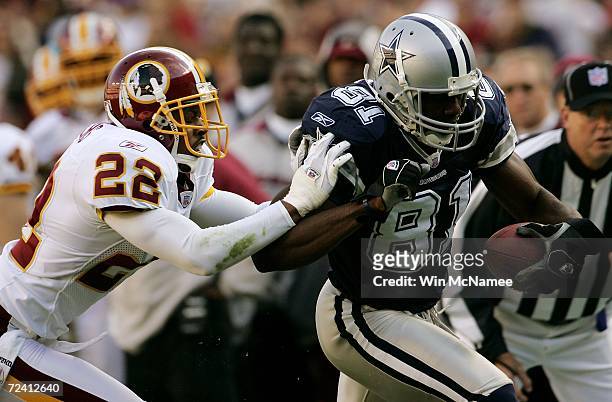 Washington Redskins cornerback Carlos Rogers tries to tackle Dallas Cowboys wide receiver Terrell Owens in second quarter action November 5, 2006 at...