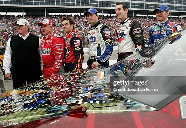 Car owner Rick Hendrick poses for a photo with his drivers Terry Labonte, driver of the Kellogg's Chevrolet, Jeff Gordon, driver of the DuPont...