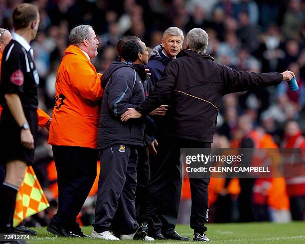United Kingdom: Arsenal manager Arsene Wenger exchanges words with West Ham manager Alan Pardew as West Ham defeat Arsenal 1-0 in the English Premier...