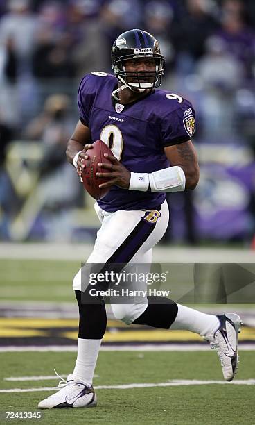 Steve McNair of the Baltimore Ravens rolls out of the pocket against the Cincinnati Bengals during the fourth quarter at M&T Bank Stadium on November...