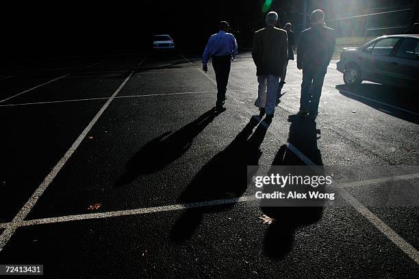 Democratic U.S. Senate candidate Jim Webb walks with his driver Mac McGarvey and former U.S. Sen. Bob Kerrey after a campaign rally November 5, 2006...