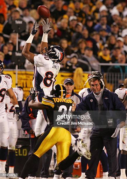 Rod Smith of the Denver Broncos fails to make the catch against the defense of Deshea Townsend of the Pittsburgh Steelers as head coach of Denver...