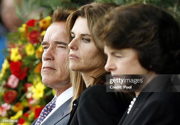 California Governor Arnold Schwarzenegger with wife Maria Shriver , and Senator Dianne Feinstein , attend services for five fallen firefighters on...