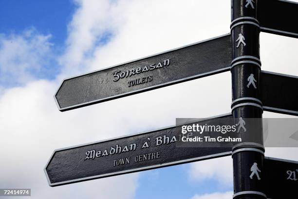 Bilingual road sign English and Scottish Gaelic directions, Stornoway, Outer Hebrides, UK.
