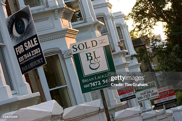 For Sale and Sold signs, West Hampstead, London, United Kingdom.