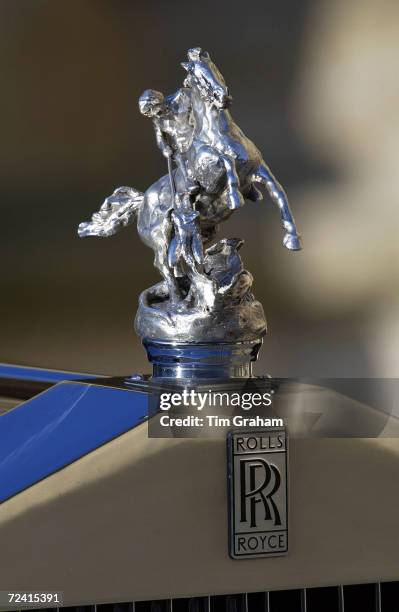 St George and Dragon car mascot on Queen's official Rolls Royce limousine, London, United Kingdom.