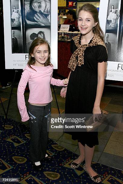 Actresses Courntney Taylor Burness and Emmy Clarke arrive for the movie premiere of Fur: An Imaginary Portrait of Diane Arbus at Chelsea West Theater...