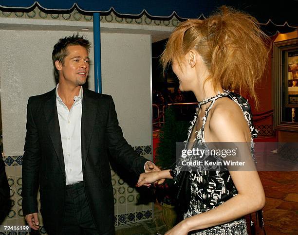 Actress Rinko Kikuchi and Brad Pitt arrives at the Paramount Vantage premiere of "Babel" held at the FOX Westwood Village theatre on November 5, 2006...