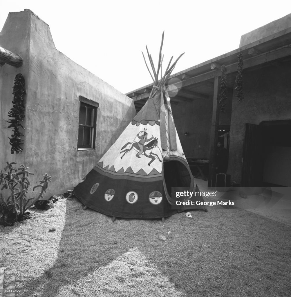 Painted tepee on courtyard, (B&W)