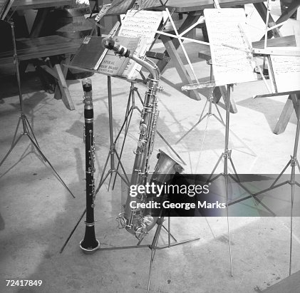 Oboe and saxophone with music sheets , (B&W) Oboe and saxophone with music sheets , (B&W)
