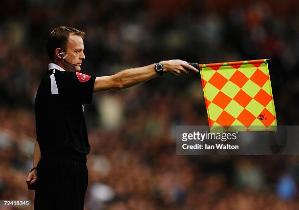 Linesman raises his flag for offside during the Barclays Premiership match between West Ham United and Arsenal at Upton Park on November 5, 2006 in...