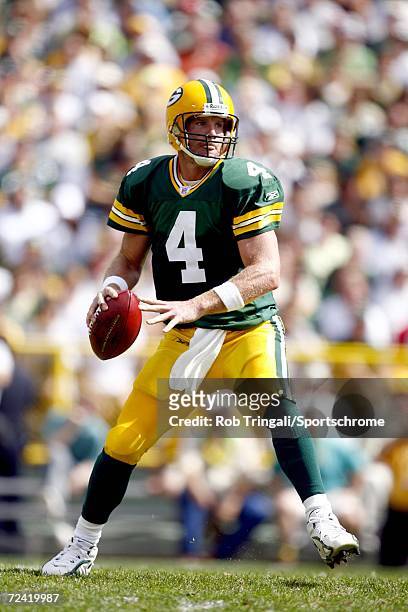 Quarterback Brett Favre of the Green Bay Packers drops back to pass against the New Orleans Saints on September 17, 2006 at Lambeau Field in Green...