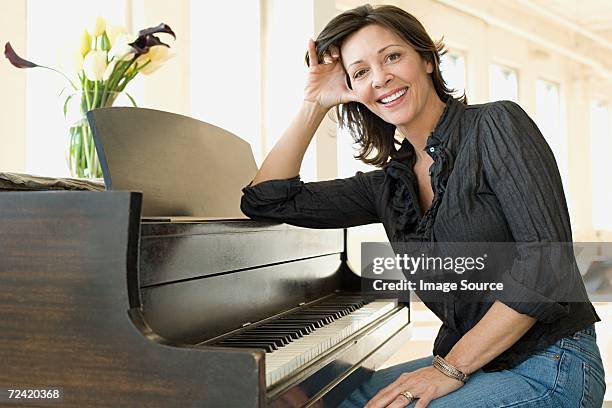 woman at her piano - pianist portrait stock pictures, royalty-free photos & images